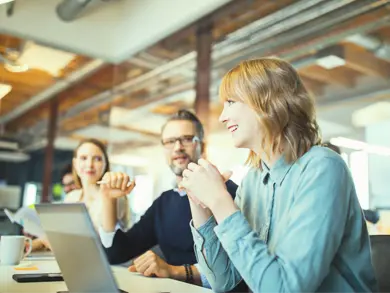 Women talking at a business meeting