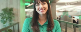 ICCU employee with her arms folded