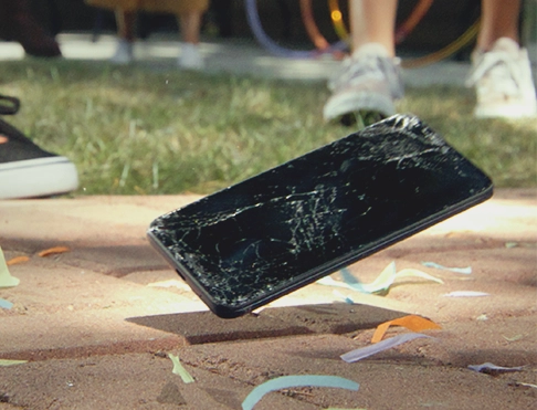 A cell phone falling to the ground