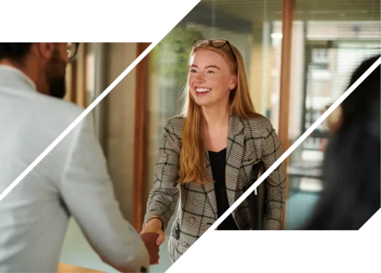 A redhead woman shaking a hiring manager's hand after applying at ICCU.