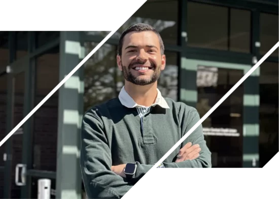 A picture of Darian Miles, an aficionado in financial literacy, crossing his arms and smiling at the camera.