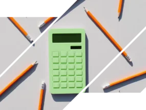 A calculator and pencils, which represent the calculations and credits of an analyzed checking account.