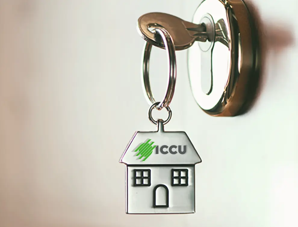 Key in a door lock with ICCU logo
