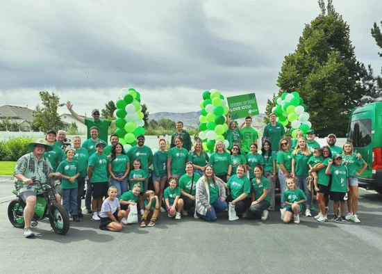 The Green Team showing support and participating in local community events.