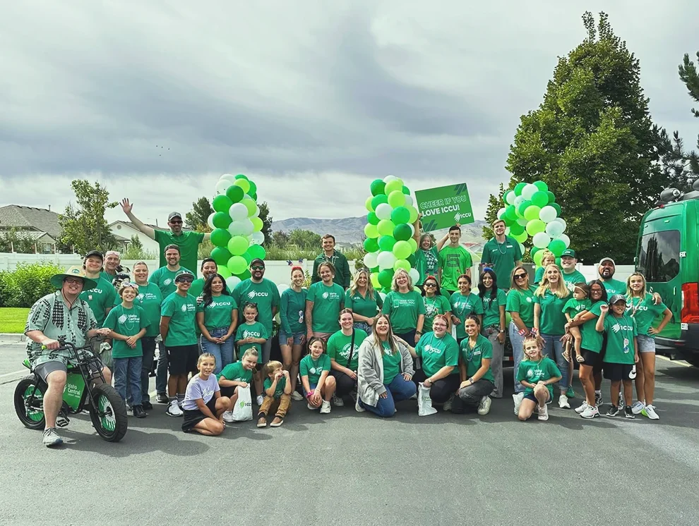 The Green Team showing support and participating in local community events.