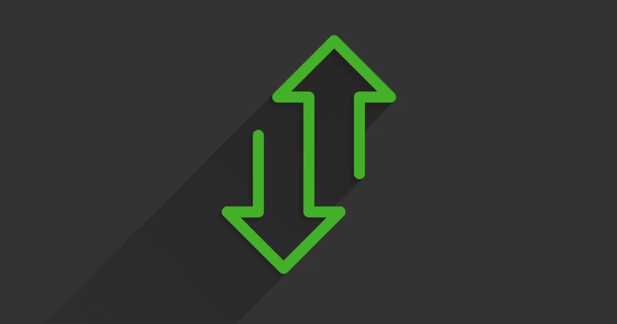 a green up/down arrow