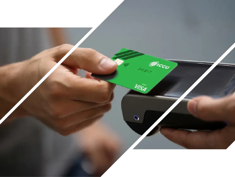 A man makes a purchase with an ICCU debit card
