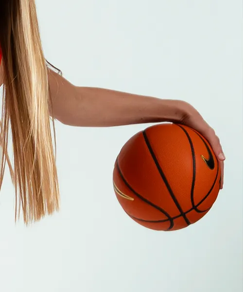 Women’s basketball athlete holding a basketball – Boise State Athletics close-up