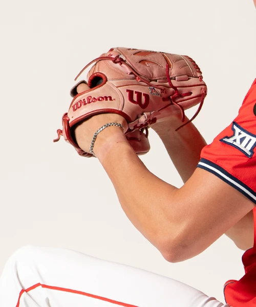 University of Arizona baseball player preparing to throw a baseball.